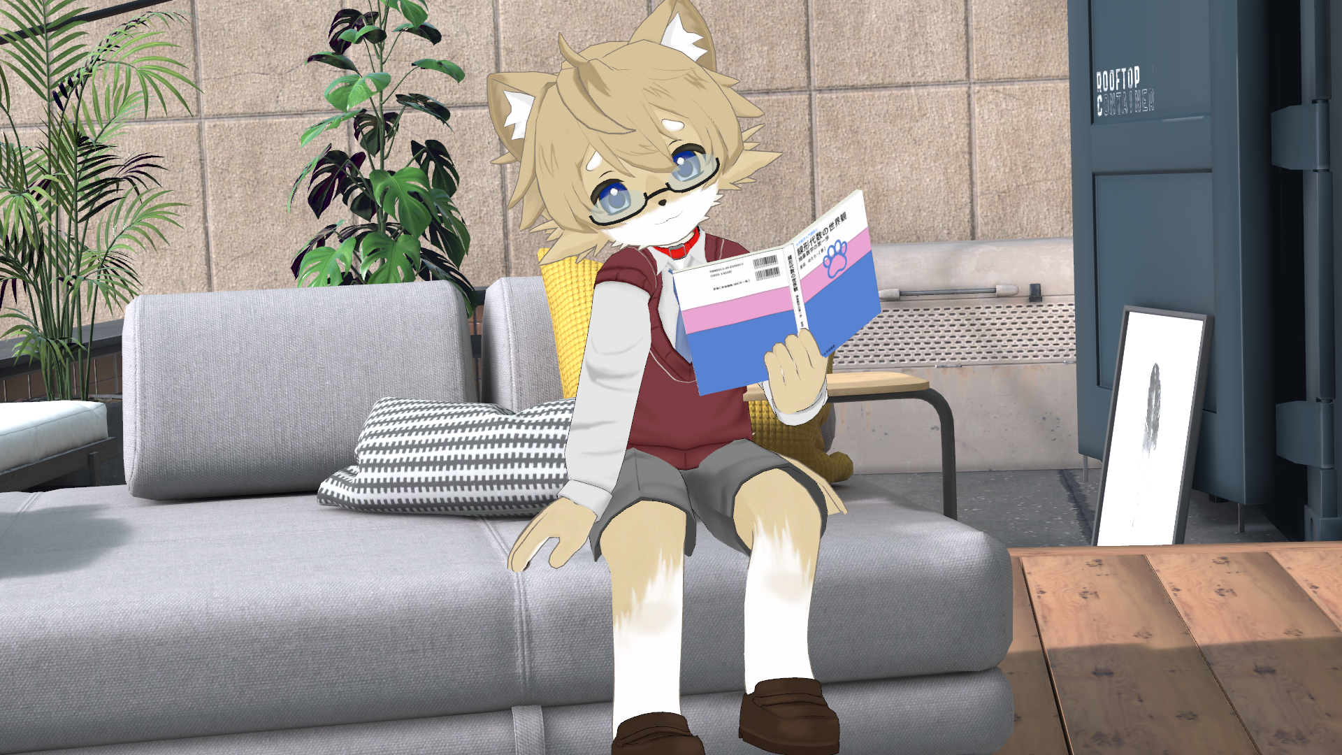 ソファに座って本を読むケモショタ